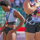 Gwen Berry turns away from the American flag as the U.S. national anthem plays, a move that has a very predictable subset of the country irate.